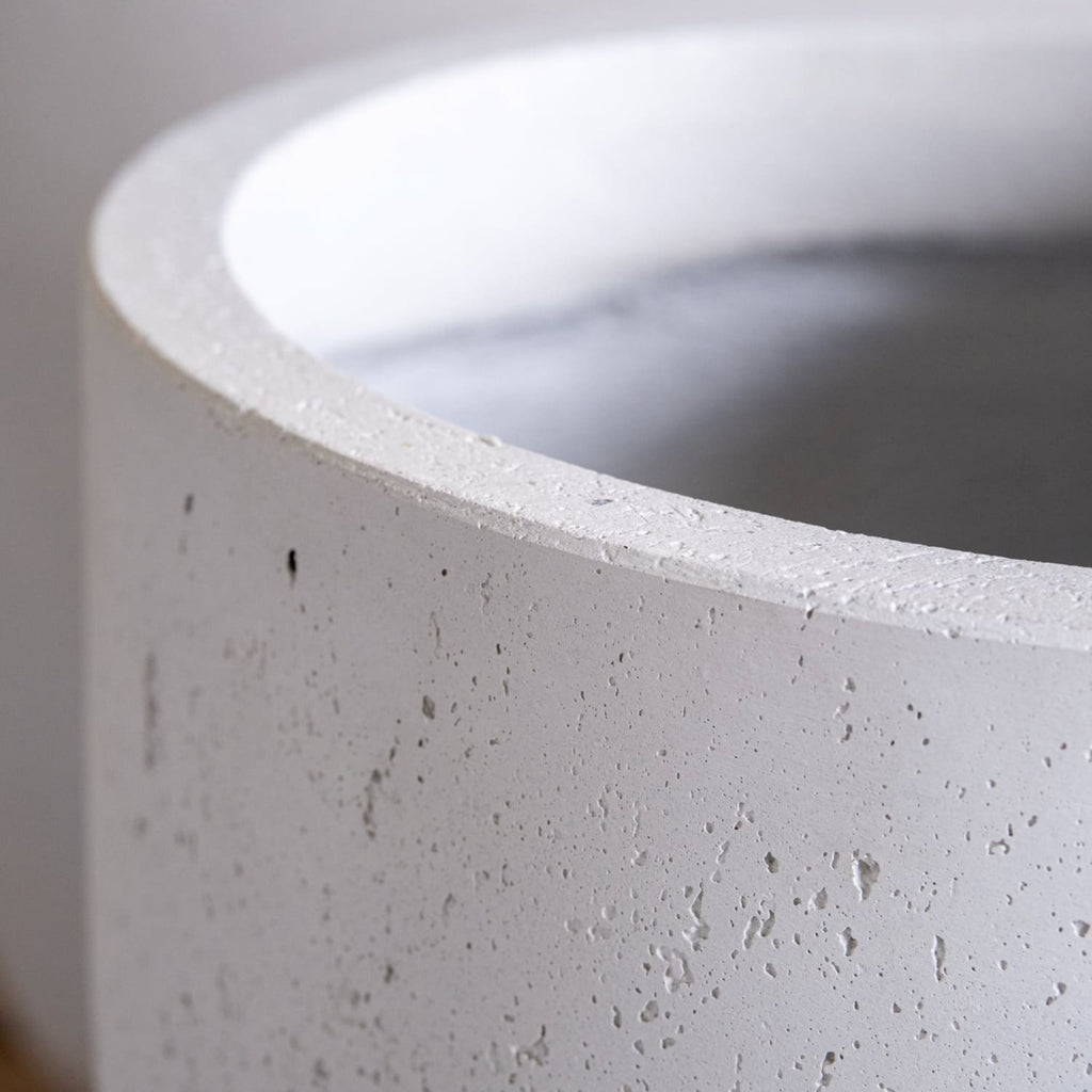 Close-up of a concrete planter with a smooth finish