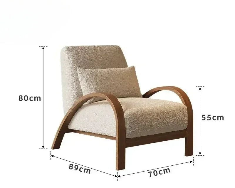 Two modern style armchairs, one with deep blue and brown lines, the other with beige and light brown lines, both with high-quality fabric seats, positioned in a room with a large window and a plant in the background.