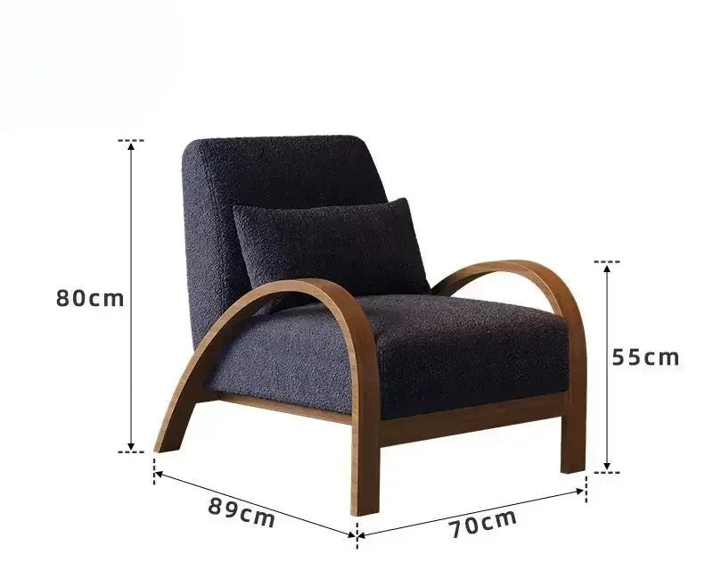 Two modern style armchairs, one with deep blue and brown lines, the other with beige and light brown lines, both with high-quality fabric seats, positioned in a room with a large window and a plant in the background.